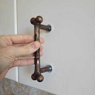 Forged Bone Door Handle: Black Metal Cabinet Drawer Pull (bronze)