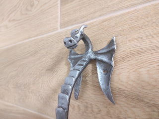 Dragon door handle in antique, medieval style