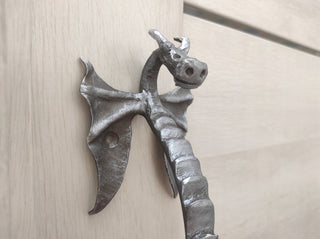 Dragon door handle in antique, medieval style