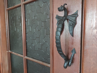 Dragon door handle in antique, medieval style