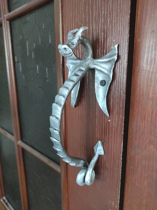 Dragon door handle in antique, medieval style