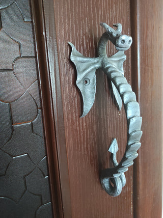 Dragon door handle in antique, medieval style