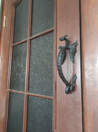 Dragon door handle in antique, medieval style