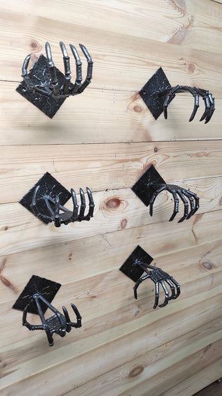 Handmade Iron Axe Wall Holder: Skeleton Hands Stand