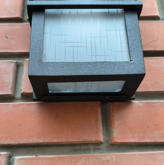 Wrought Iron Outdoor Sconce: Minimalist Metal Light Fixture
