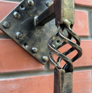 Hand Forged Bronze Wall Sconce: Medieval Style Accent Light