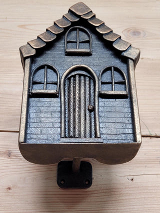 Metal house door handle. Unusual door handle.