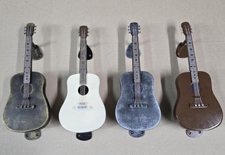 Metal door handle in the shape of a guitar. Finish in 4 colors