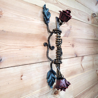 Artistic floral iron door pull with leaf details