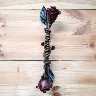 Rose-themed iron door pull for indoor and outdoor use