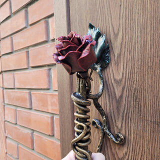 Hand-forged wrought iron rose door handle
