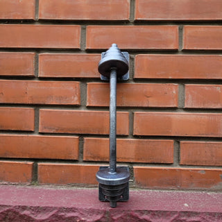 Heavy-duty metal dumbbell door pull, crafted from wrought iron, ideal for gates, barn doors, and gyms.
