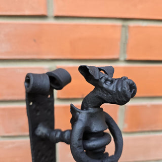 Handmade black iron door handle for exterior or interior use.