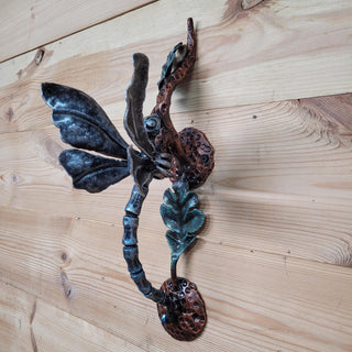 Handcrafted wrought iron dragonfly handle with oak branch design