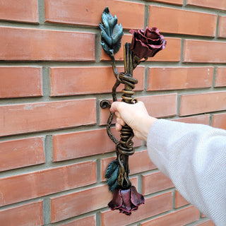 Romantic door handle with iron roses and leaves
