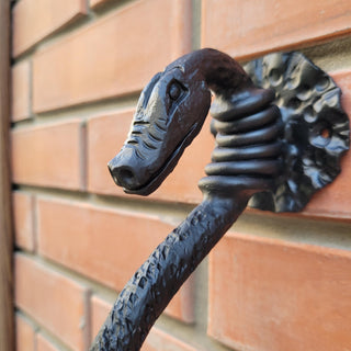 Hand-forged wrought iron snake door handle