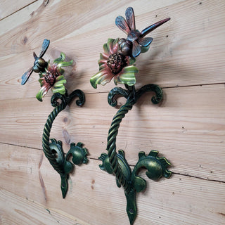 Handcrafted iron door handle with nature-inspired design