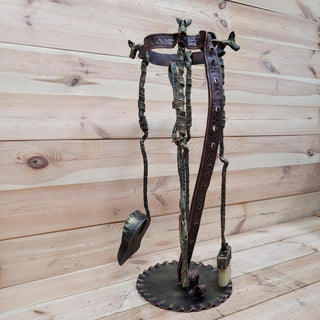 Forged fireplace tool set with dog head handles and leash collar stand