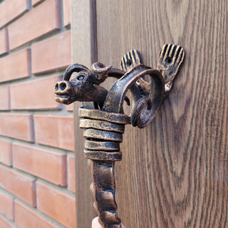 Hand forged bull head door handle in antique bronze finish