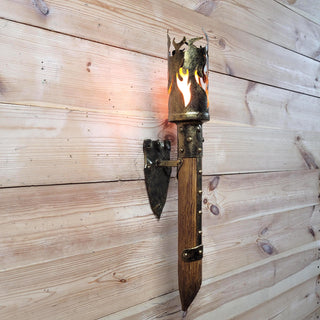 Add a dramatic medieval touch to your interior with this handcrafted wall-mounted torch light. Designed with a solid wood base, forged steel flame crown, and aged bronze accents, it brings authentic fantasy vibes to any space — perfect for taverns, themed rooms, or cosplay backdrops.

Please note: the bulb is not included and shown only for visual presentation.
Compatible with standard E27 LED bulbs.