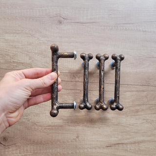 Forged Bone Door Handle: Black Metal Cabinet Drawer Pull (bronze)